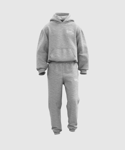 Walking animated gray hoodie and jogger set on a white background