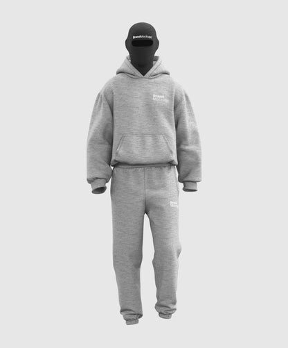 Walking animated ray hoodie and pants set with a black mask on a white background
